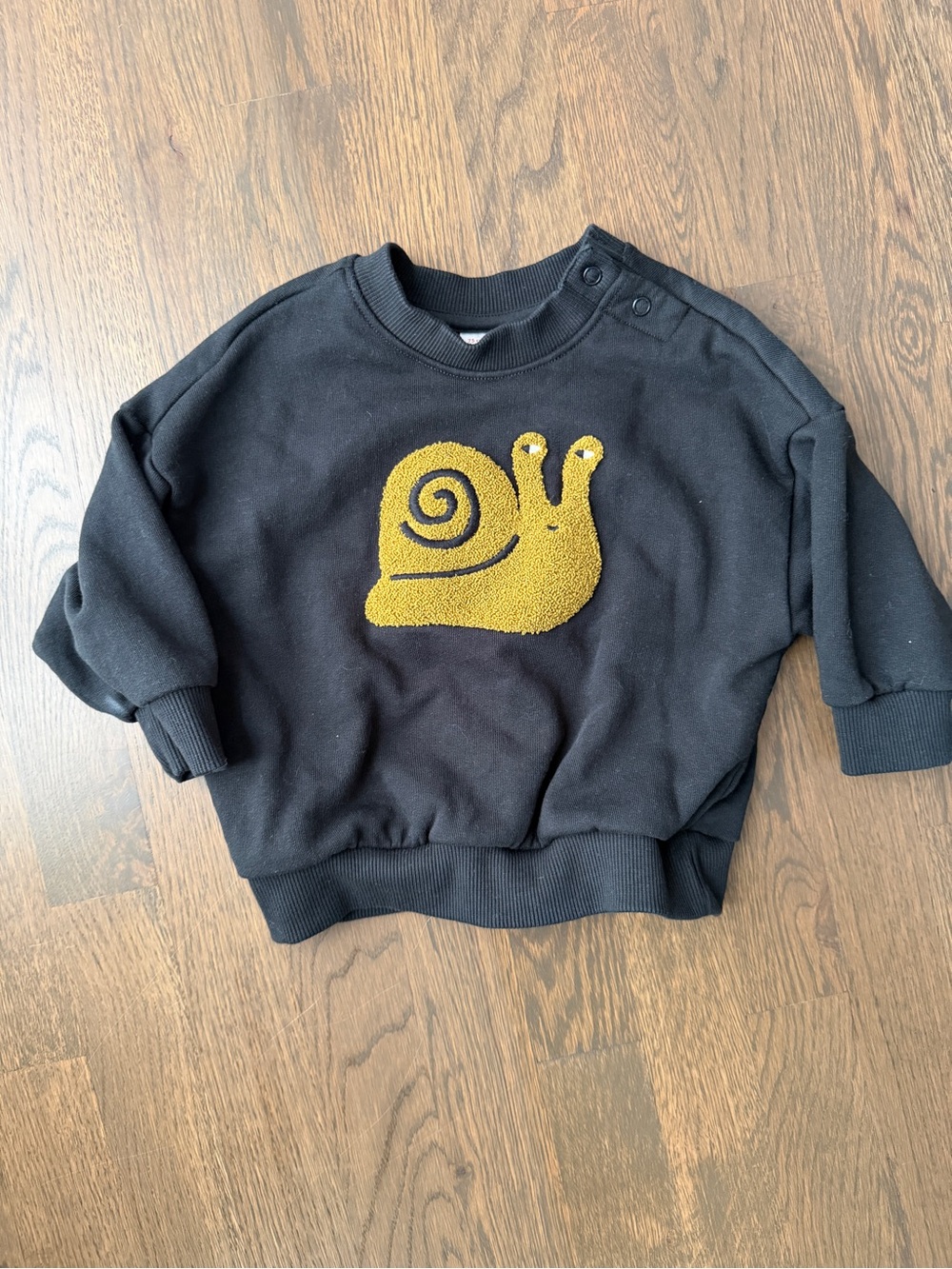 Hanna Anderson Kids Black Sweatshirt with Yellow Snail Applique
